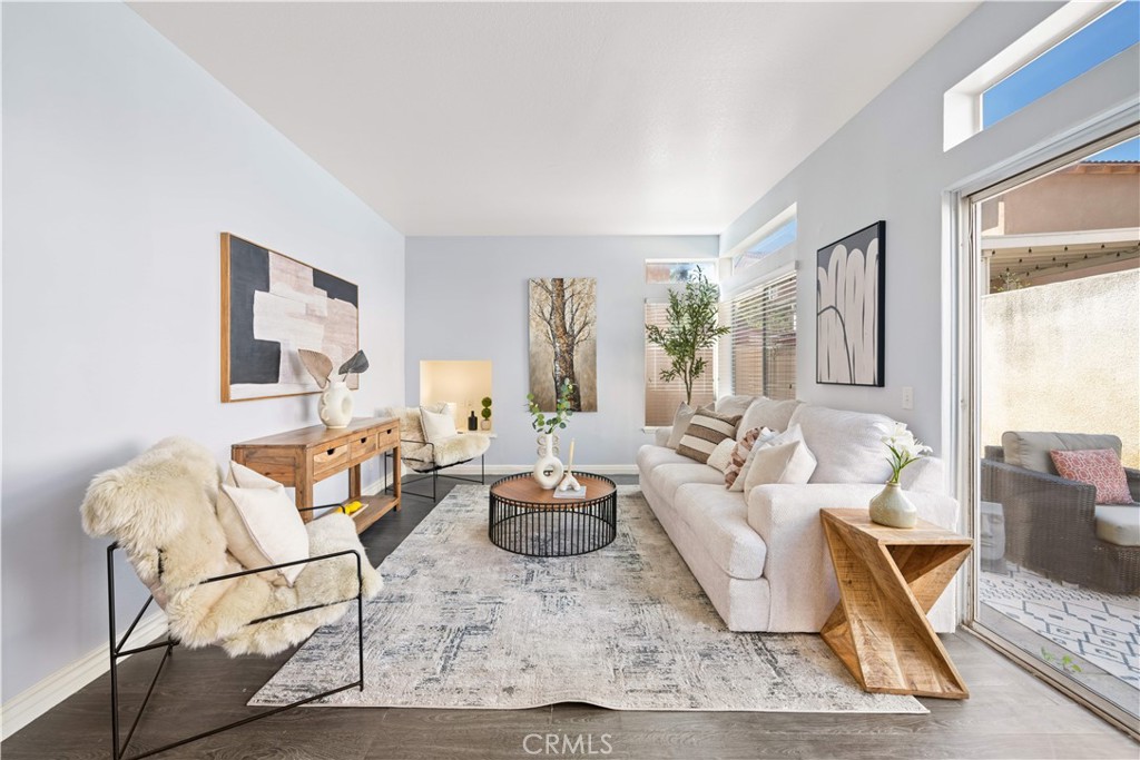 688 North Rimsdale Avenue, Unit 13 Covina, CA 91722 - Photo 20 of 52 a living room with fireplace furniture and a rug