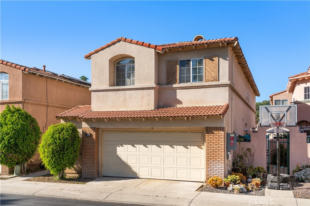 688 North Rimsdale Avenue, Unit 13 Covina, CA 91722 - Photo 2 of 52 a front view of a house