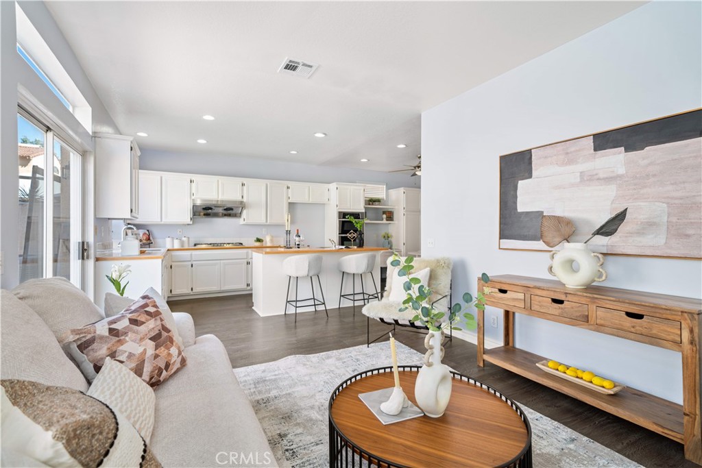688 North Rimsdale Avenue, Unit 13 Covina, CA 91722 - Photo 21 of 52 a living room with furniture and kitchen view