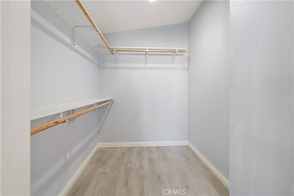 688 North Rimsdale Avenue, Unit 13 Covina, CA 91722 - Photo 31 of 52 a view of walk in closet with empty racks