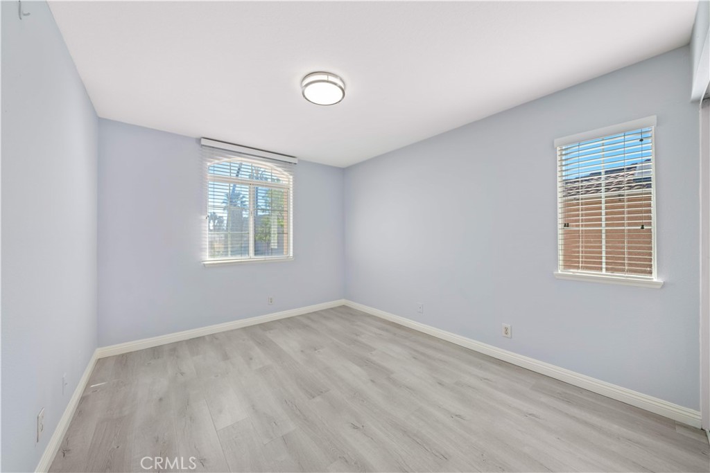688 North Rimsdale Avenue, Unit 13 Covina, CA 91722 - Photo 47 of 52 an empty room with windows