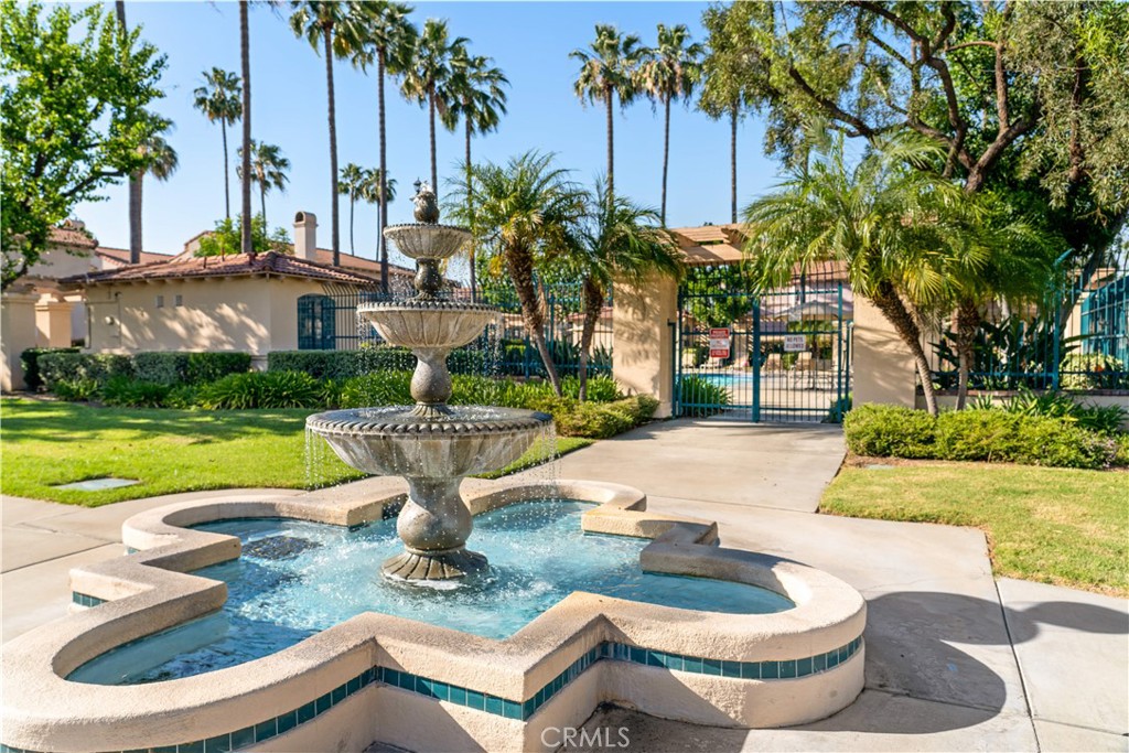 688 North Rimsdale Avenue, Unit 13 Covina, CA 91722 - Photo 51 of 52 a view of a swimming pool with a patio