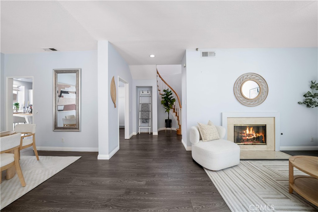 688 North Rimsdale Avenue, Unit 13 Covina, CA 91722 - Photo 6 of 52 a living room with furniture and a wooden floor