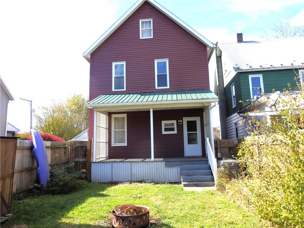 621 Williams Street Confluence, PA 15424 - Photo 5 of 21 a front view of a house with garden