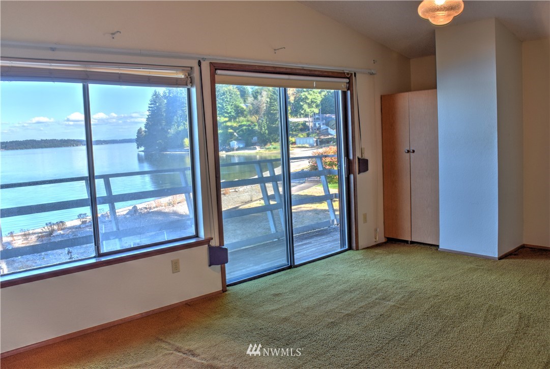7130 Sandy Point Road Northeast Olympia, WA 98516 - Photo 24 of 32 a view of empty room with front door
