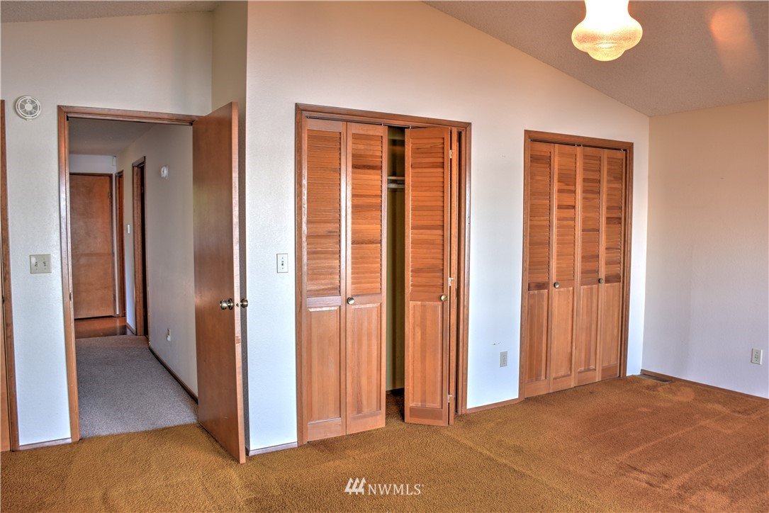 7130 Sandy Point Road Northeast Olympia, WA 98516 - Photo 26 of 32 a view of a room with a large windows