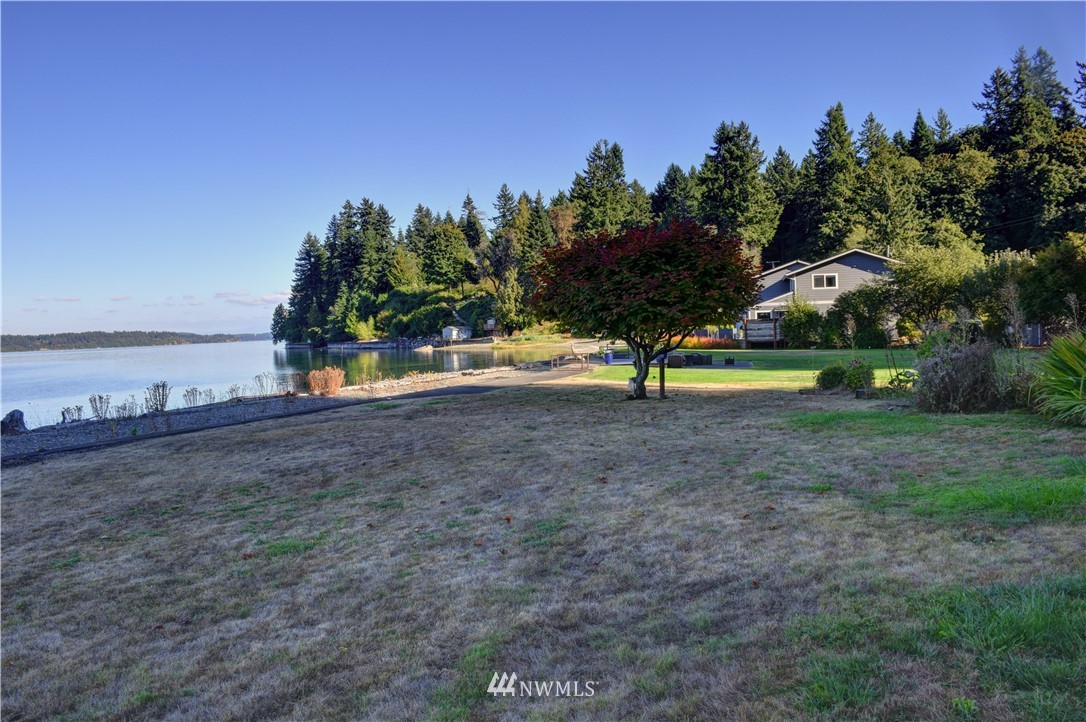 7130 Sandy Point Road Northeast Olympia, WA 98516 - Photo 30 of 32 a view of a park with large trees