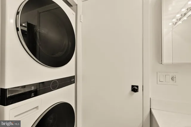 a utility room with dryer and washer