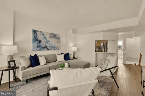 a living room with furniture and a couch