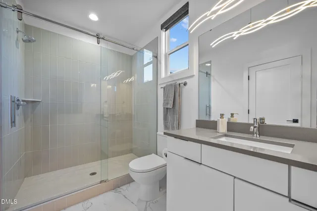 a room with bed and a window