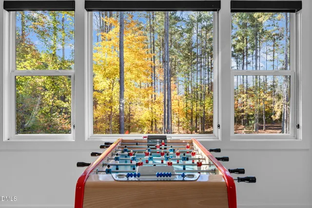 a view of a room with a large window