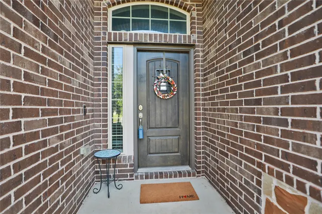 a view of outdoor space with wooden door