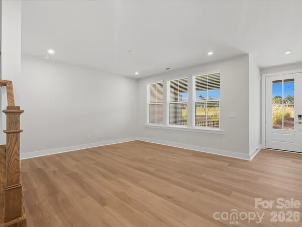 a view of kitchen with wooden floor