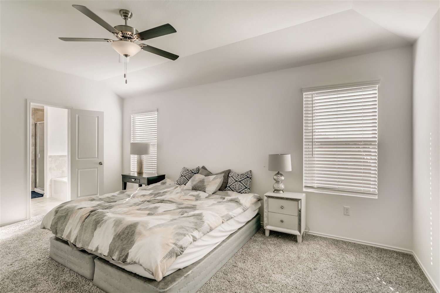 3901 Fort Collins Way Austin, TX 78744 - Photo 12 of 26 a bedroom with a bed and a window