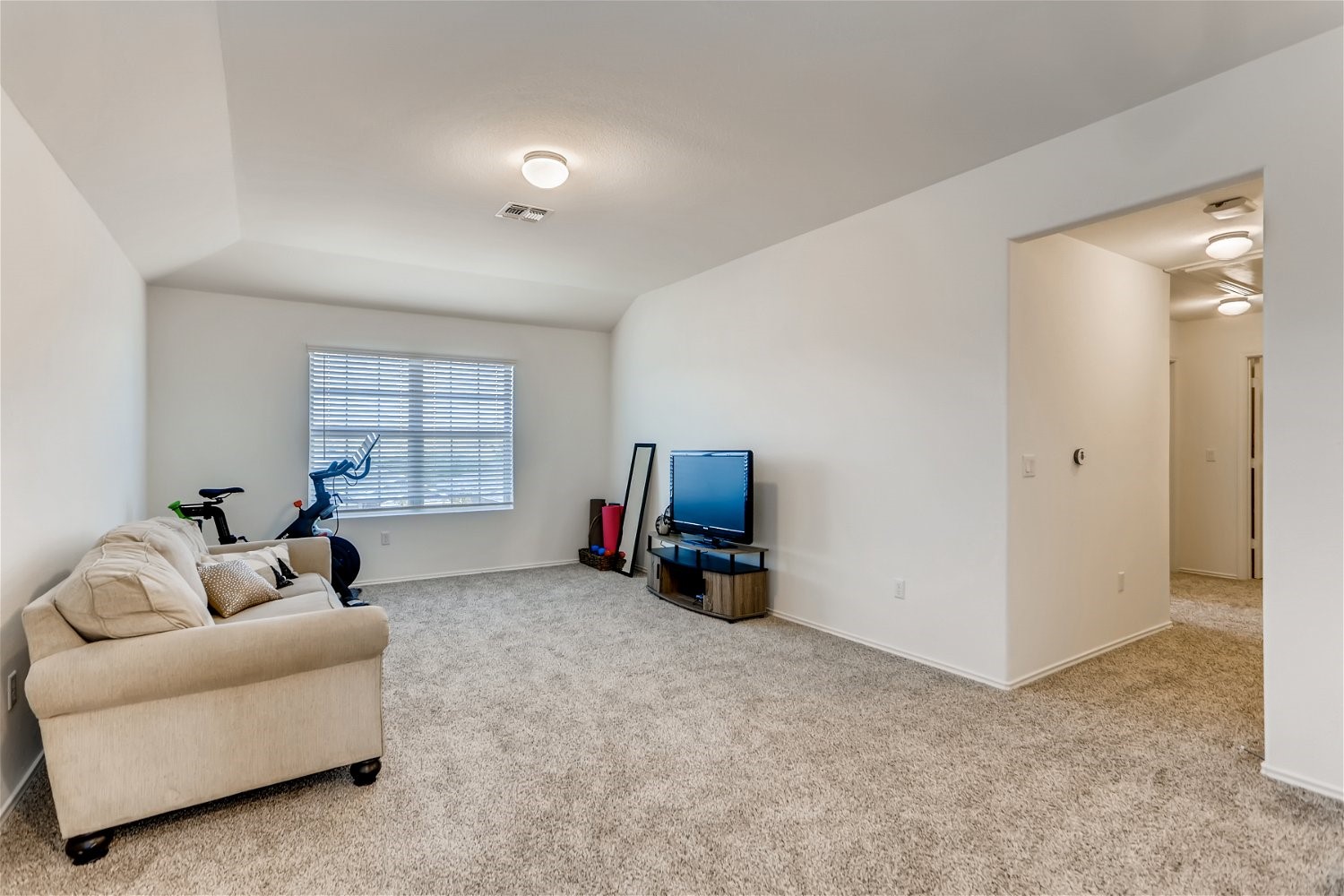 3901 Fort Collins Way Austin, TX 78744 - Photo 21 of 26 a living room with furniture and a window