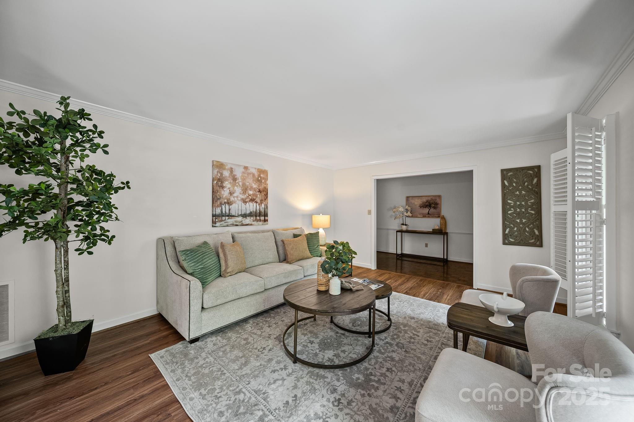 1676 Partridge Circle Lancaster, SC 29720 - Photo 5 of 43 a living room with furniture potted plant and a window