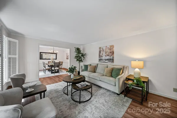 a living room with furniture and a couch