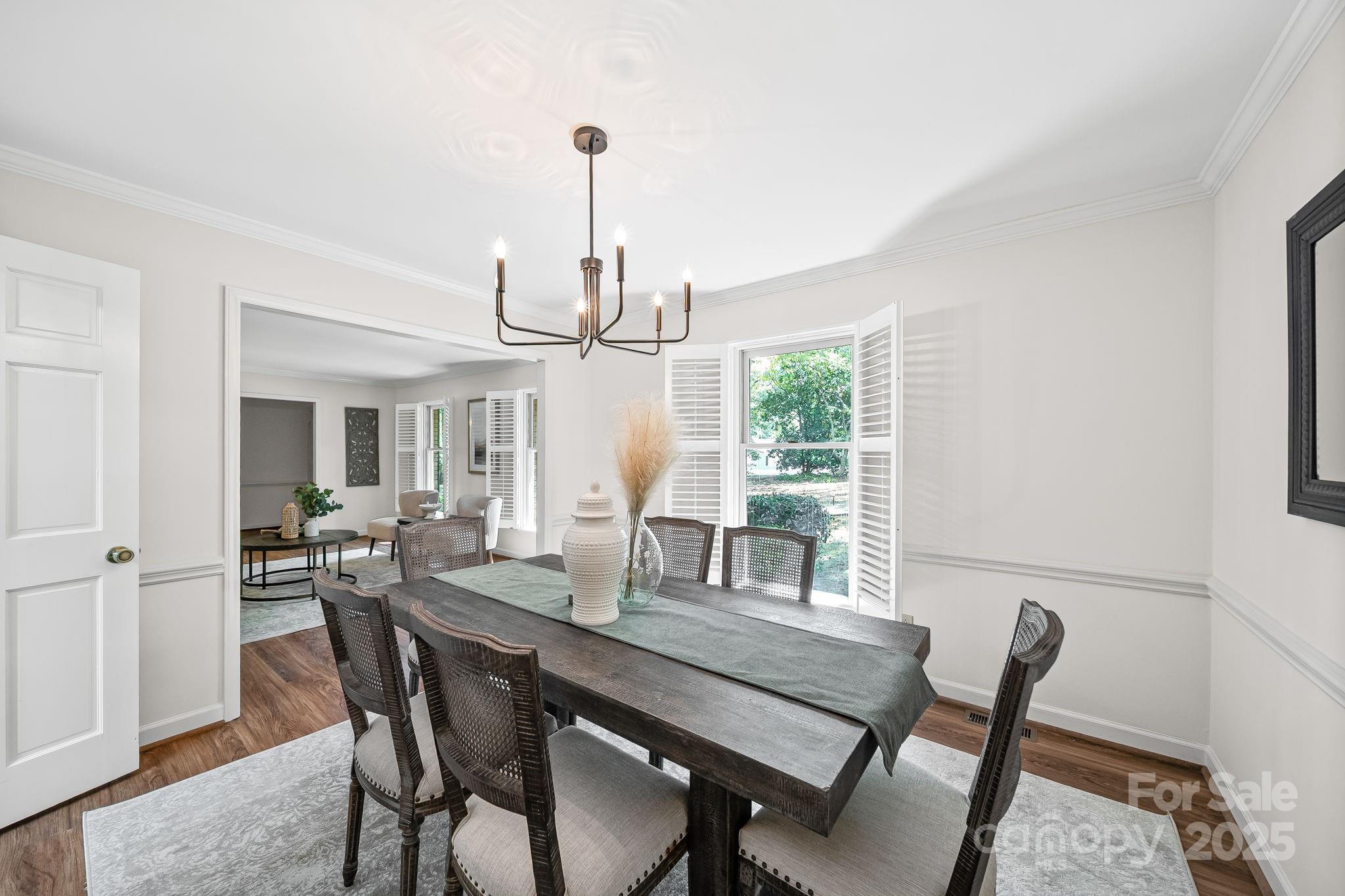 1676 Partridge Circle Lancaster, SC 29720 - Photo 9 of 43 a view of a dining room with furniture window and wooden floor