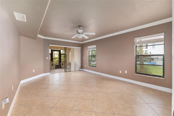 a view of an empty room with a window