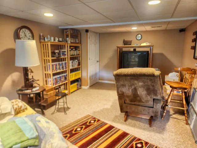 a room with furniture and a chair