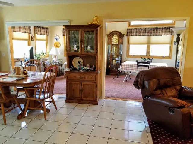a view of a livingroom with furniture window and outside view