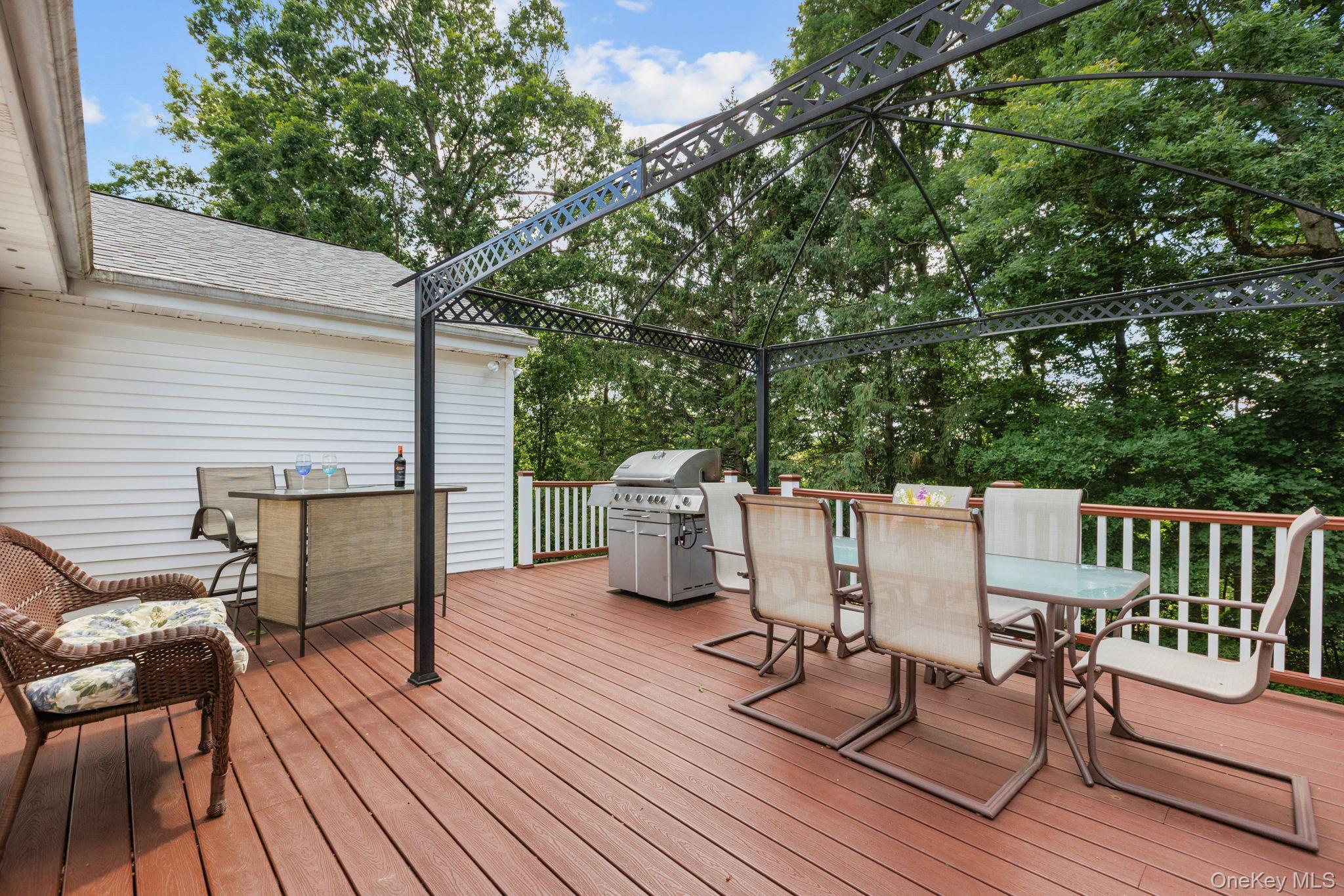 25 Harmony Road Brewster, NY 10509 - Photo 35 of 42 Raised deck with room for gazebo, patio furniture and bar for entertainment.
