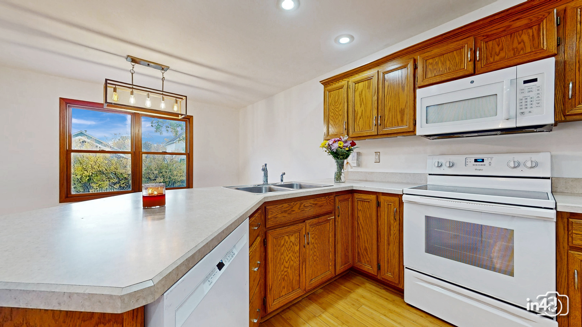 502 West 4th Street Sandwich, IL 60548 - Photo 10 of 33 a kitchen with a sink cabinets and appliances