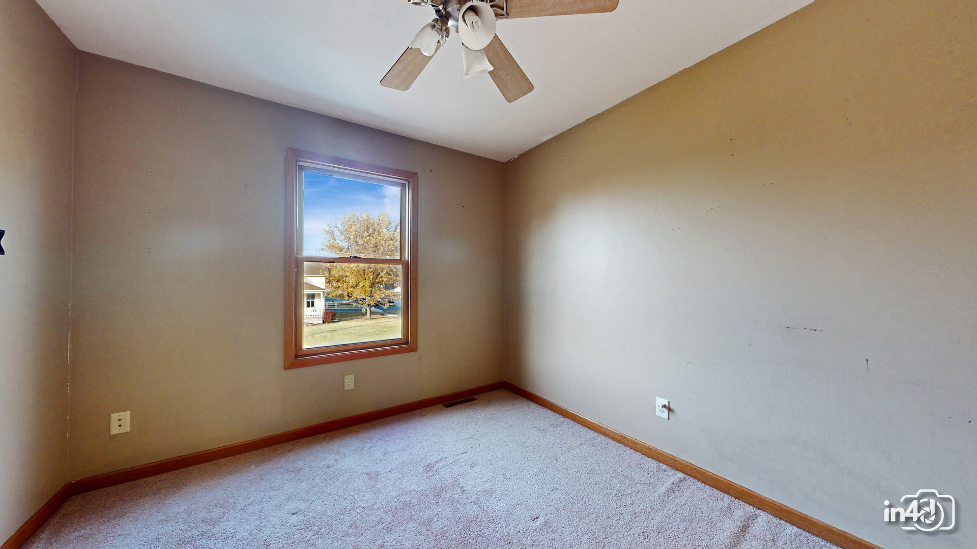 502 West 4th Street Sandwich, IL 60548 - Photo 17 of 33 a view of an empty room with a window
