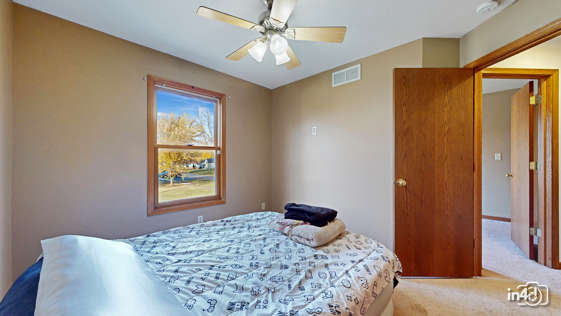 502 West 4th Street Sandwich, IL 60548 - Photo 21 of 33 a bedroom with a bed and a window