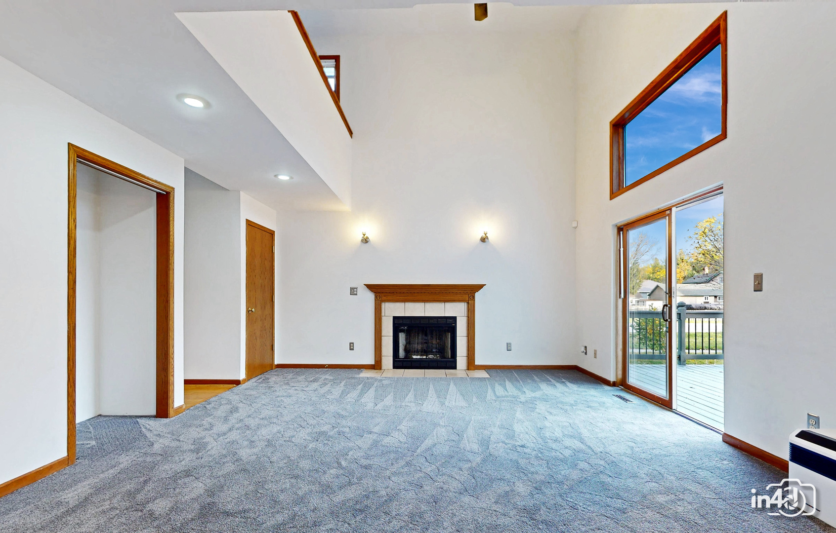 502 West 4th Street Sandwich, IL 60548 - Photo 2 of 33 an empty room with windows and fireplace