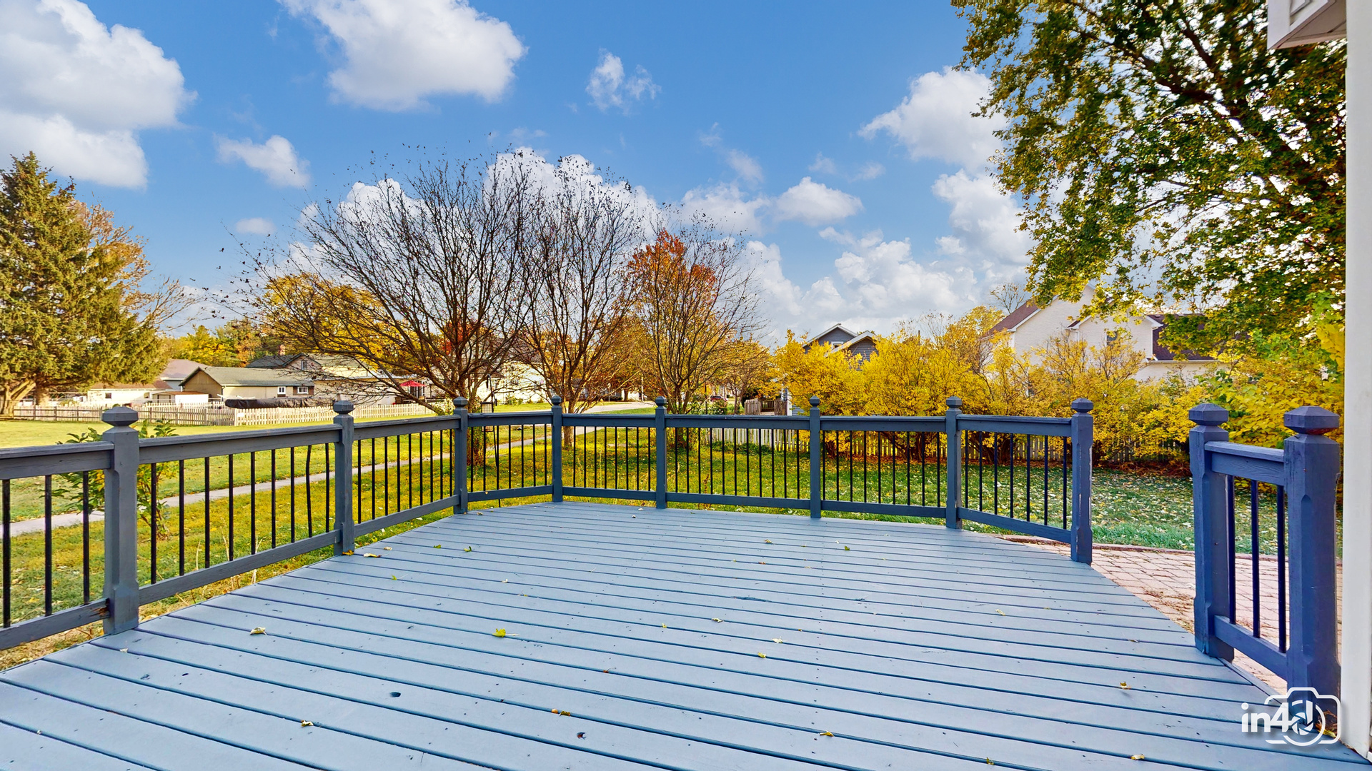 502 West 4th Street Sandwich, IL 60548 - Photo 3 of 33 a view of a terrace with wooden floor and fence