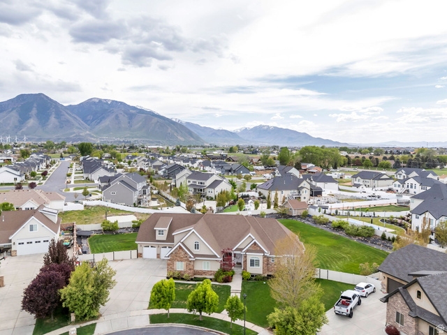 1355 West 1000 South Mapleton, UT 84664 - Photo 64 of 74 Aerial perspective of suburban area with mountains