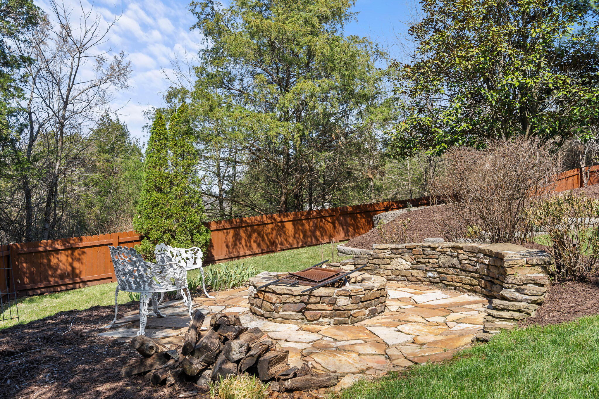 512 Silverwood Place Reeds Spring, MO 65737 - Photo 63 of 84 Privacy Fence and Fire Pit