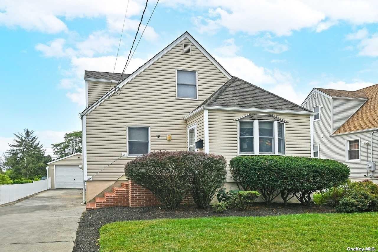 18 Westmoreland Road Merrick, NY 11566 - Photo 1 of 1 a view of a house with a yard