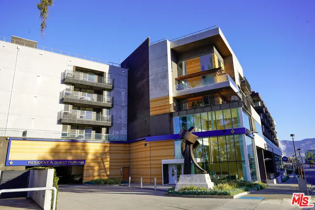 a front view of a building with glass windows