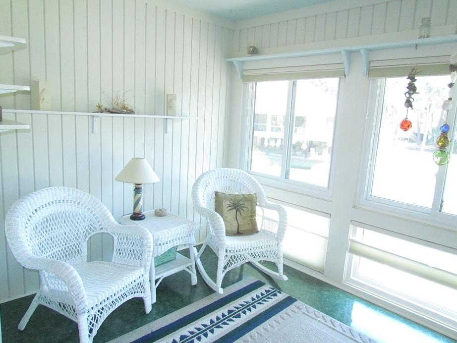 844 Club Cottage Road Edisto Beach, SC 29438 - Photo 16 of 49 sunroom