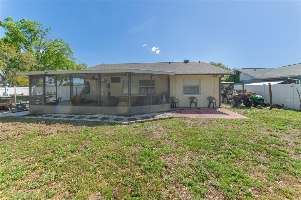 8715 Huntsman Lane Port Richey, FL 34668 - Photo 53 of 54 a front view of a house with garden