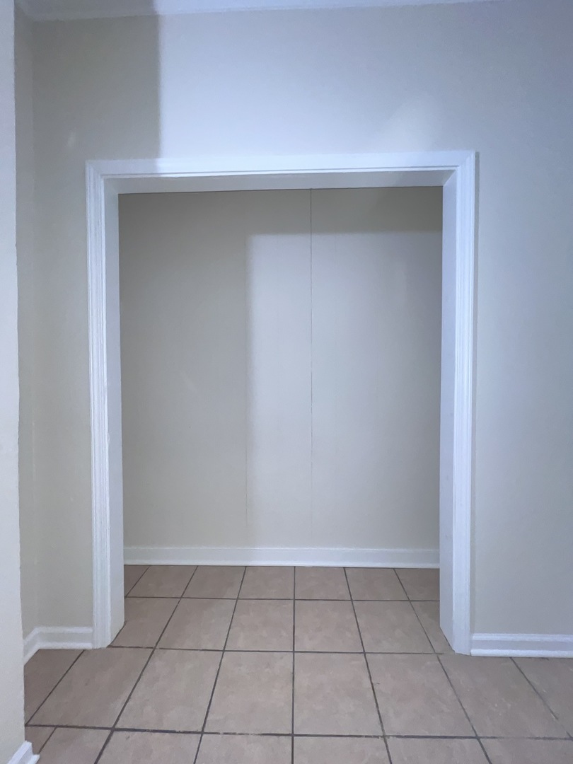 8919 South Muskegon Avenue, Unit 1F Chicago, IL 60617 - Photo 16 of 33 a view of an empty room