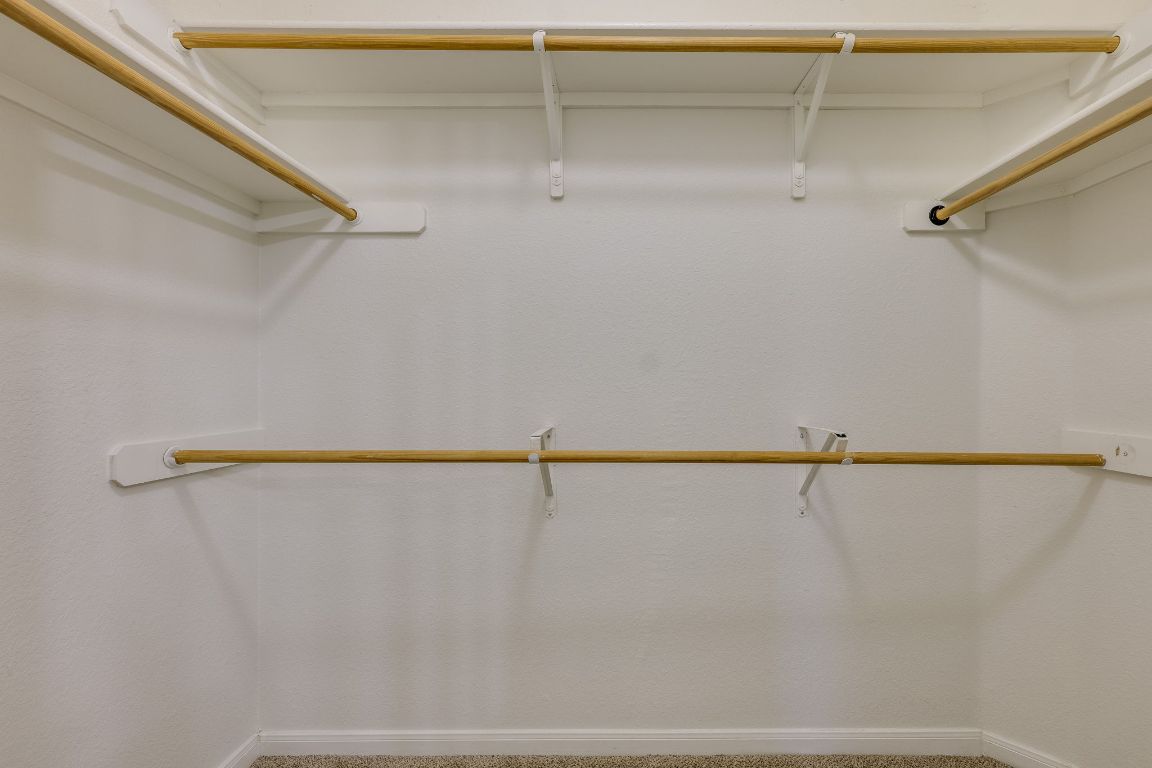 2100 Pipers Field Drive, Unit 14 Austin, TX 78758 - Photo 23 of 30 a view of a room with racks on the wall