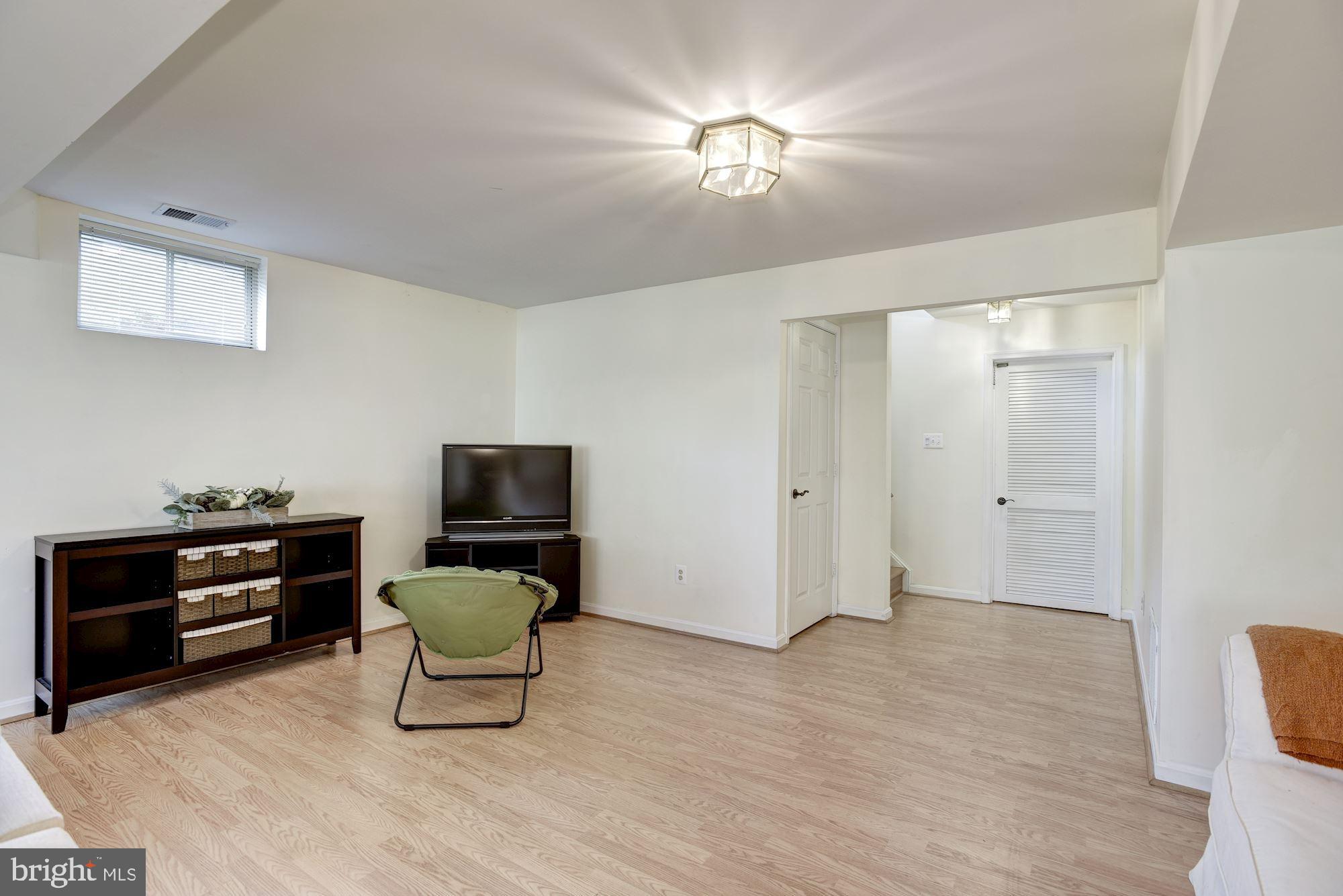 11410 Night Star Way Reston, VA 20194 - Photo 33 of 49 Lower level recreation room
