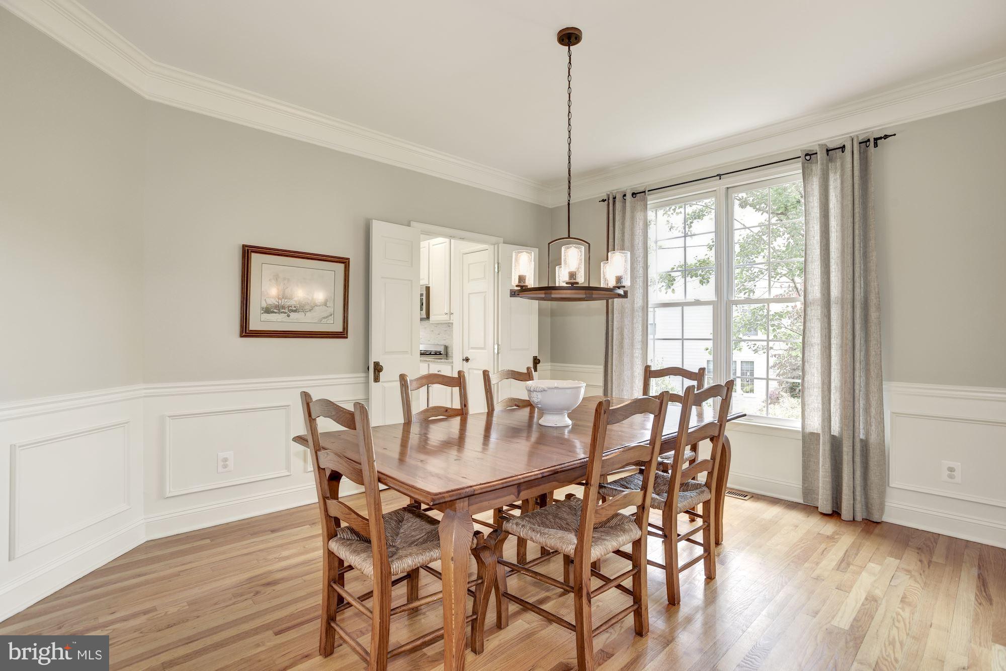 11410 Night Star Way Reston, VA 20194 - Photo 8 of 49 Formal dining room with upgraded chandelier