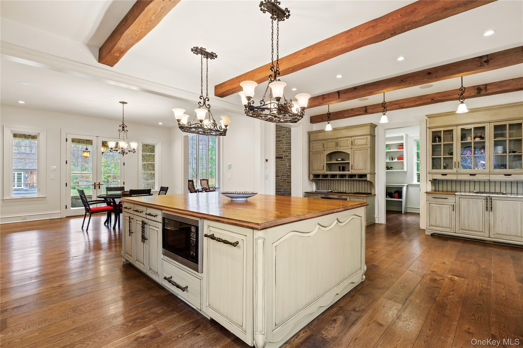72 Guard Hill Road Bedford Corners, NY 10549 - Photo 11 of 50 a kitchen with stainless steel appliances granite countertop a stove and cabinets