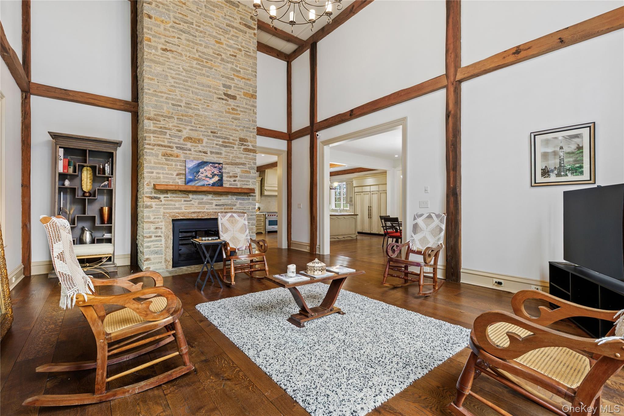 72 Guard Hill Road Bedford Corners, NY 10549 - Photo 12 of 50 a living room with furniture and a fireplace