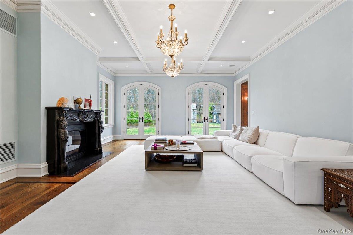 72 Guard Hill Road Bedford Corners, NY 10549 - Photo 15 of 50 a living room with furniture and a large window
