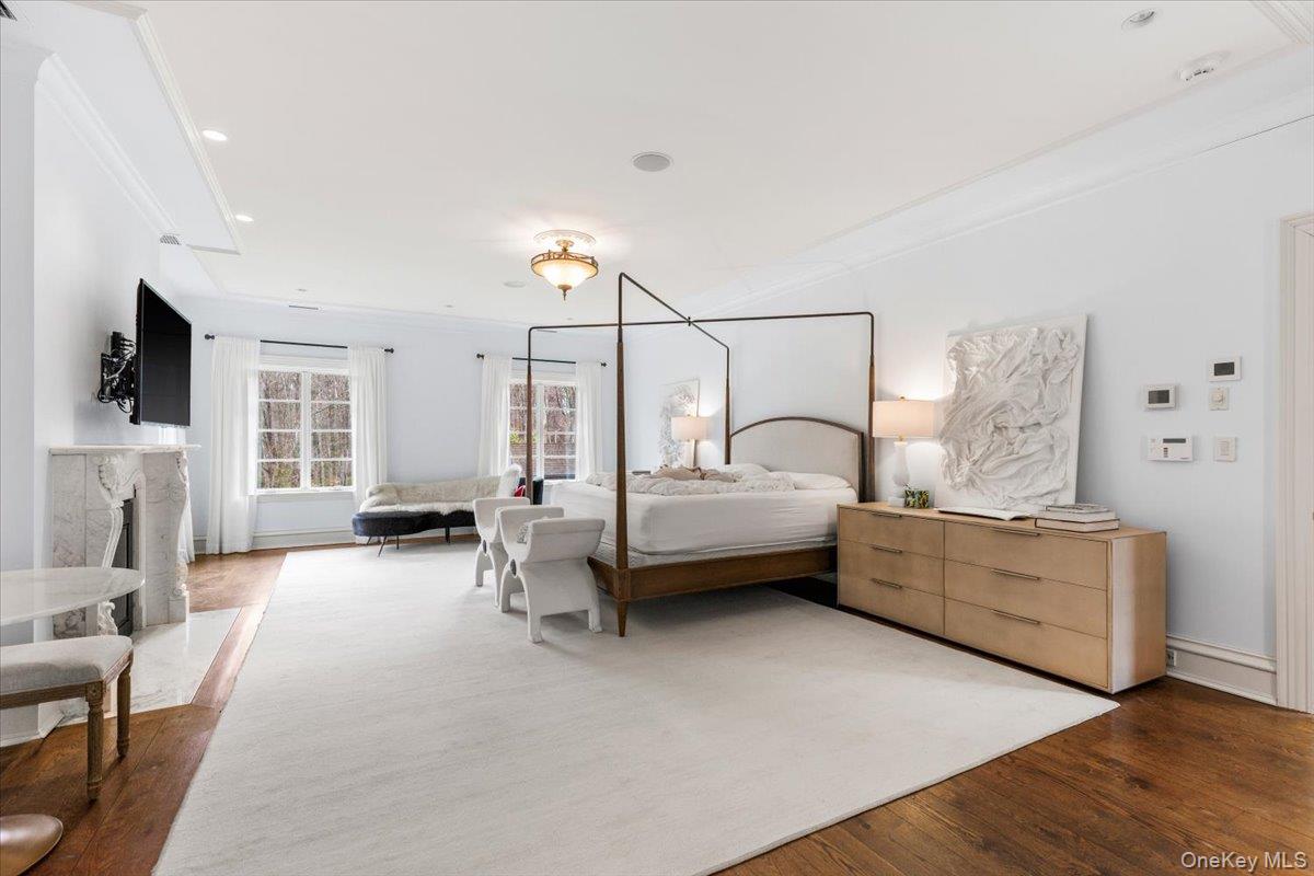 72 Guard Hill Road Bedford Corners, NY 10549 - Photo 25 of 50 a bedroom with furniture and a large window