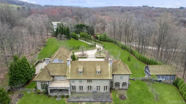 an aerial view of a house with a garden