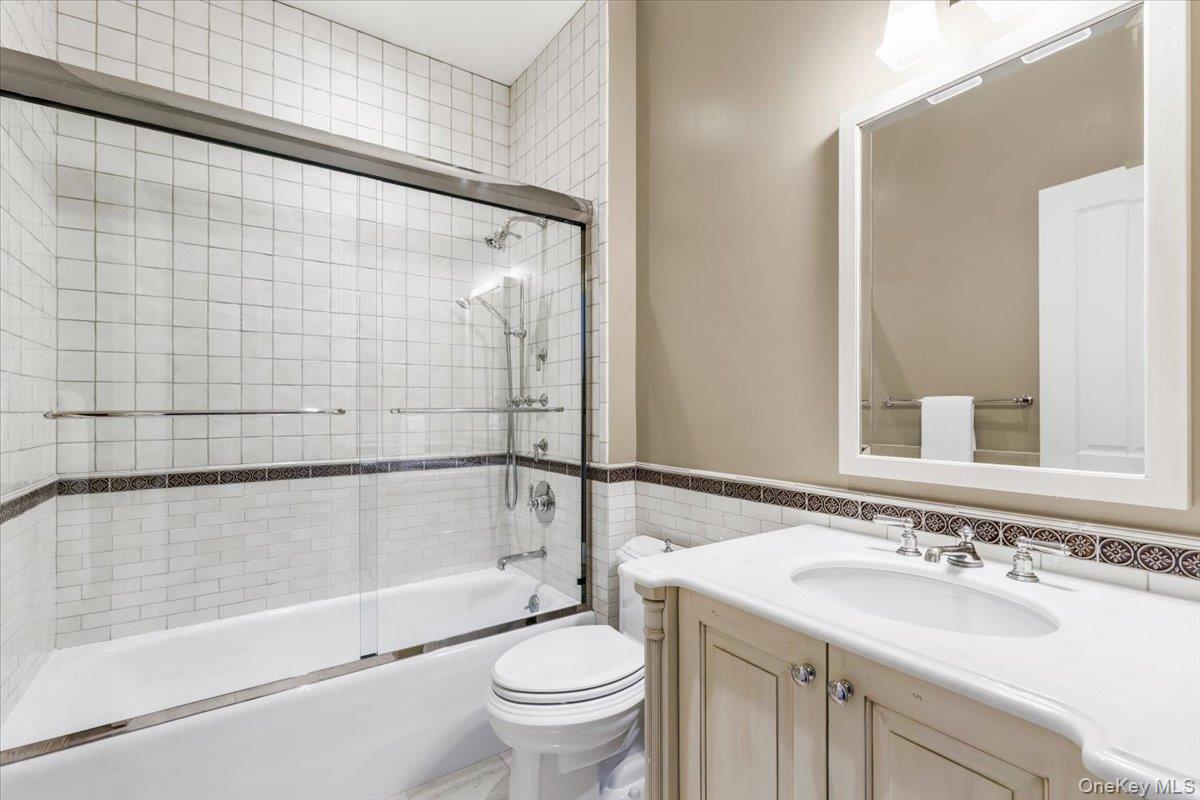 72 Guard Hill Road Bedford Corners, NY 10549 - Photo 31 of 50 a bathroom with a sink and a mirror