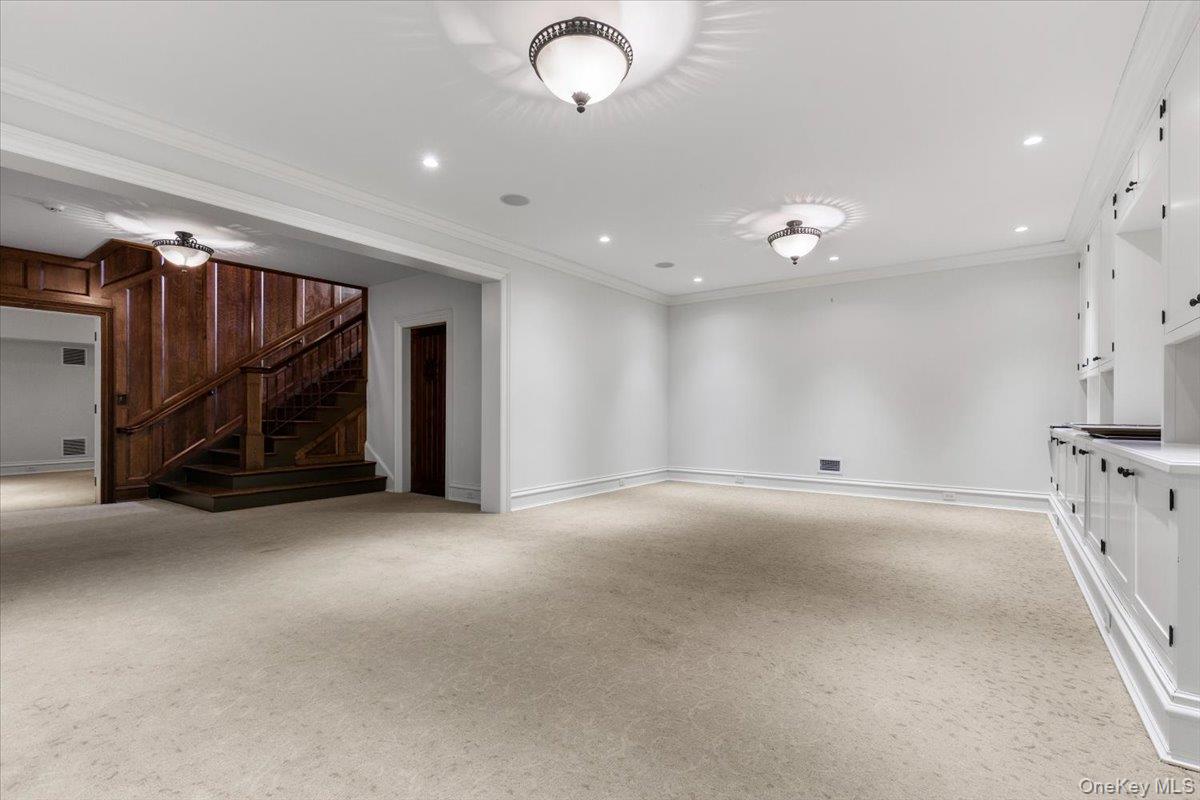 72 Guard Hill Road Bedford Corners, NY 10549 - Photo 38 of 50 a view of an empty room with stairs