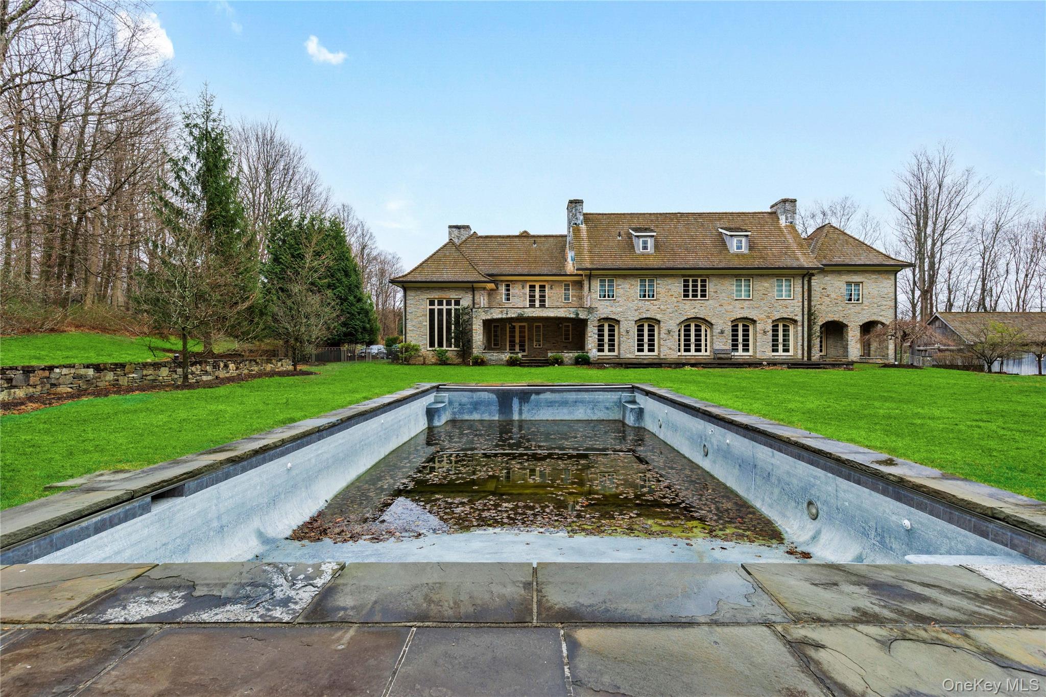 72 Guard Hill Road Bedford Corners, NY 10549 - Photo 42 of 50 a view of swimming pool with outdoor seating and yard