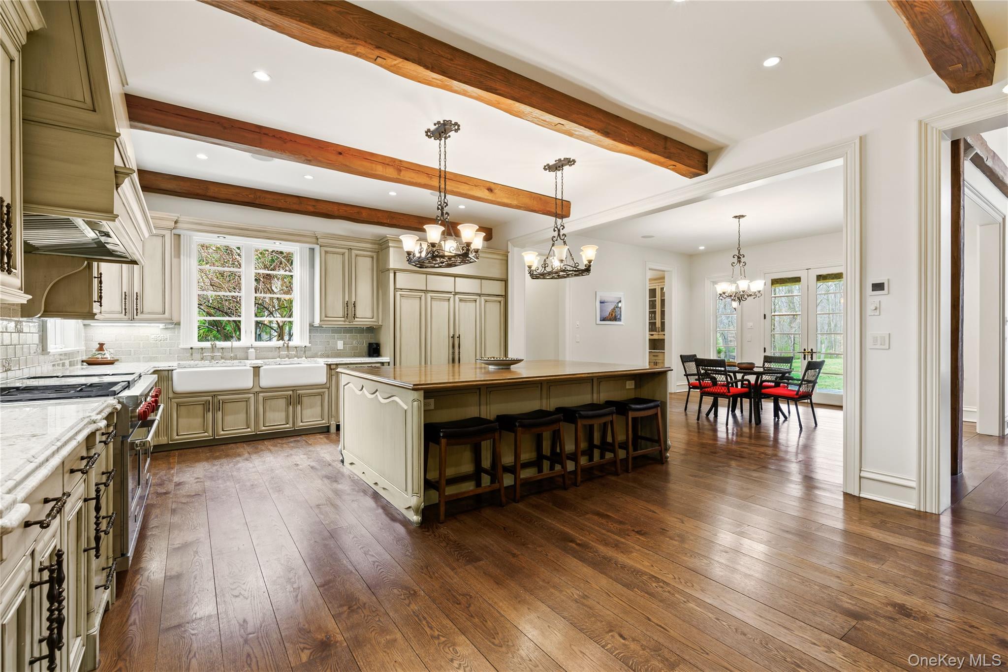 72 Guard Hill Road Bedford Corners, NY 10549 - Photo 9 of 50 a large white kitchen with stainless steel appliances